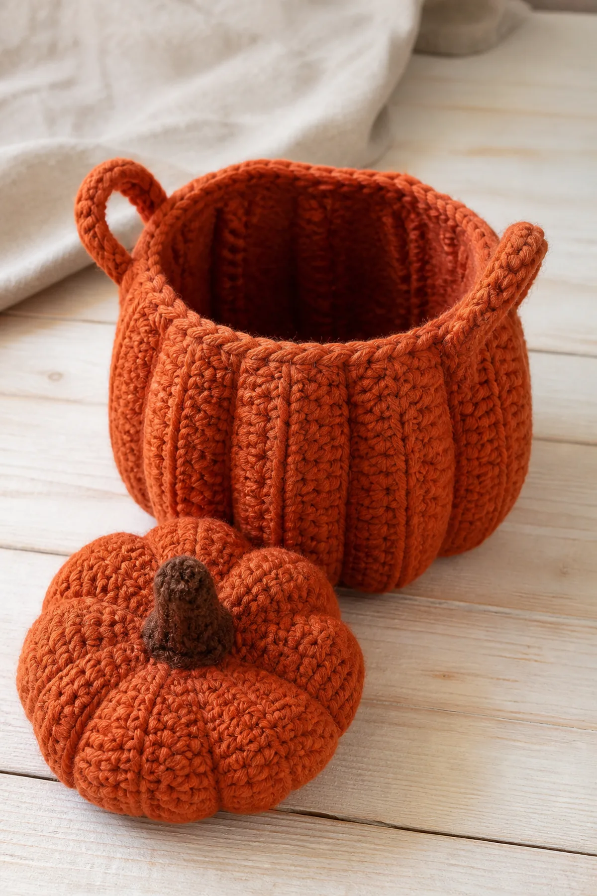 Later shaping and assembly stage of the crochet pumpkin basket